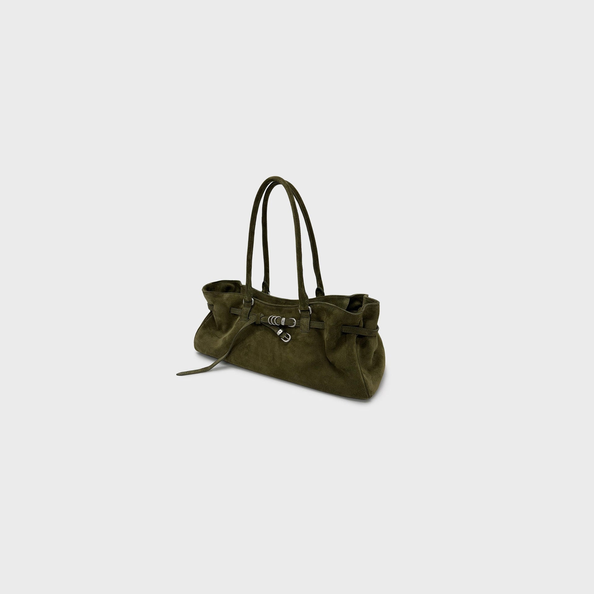 MARGESHERWOOD Soft Grandma dark olive suede shoulder bag, three-quarter side angle showing dual handles and buckle tie strap