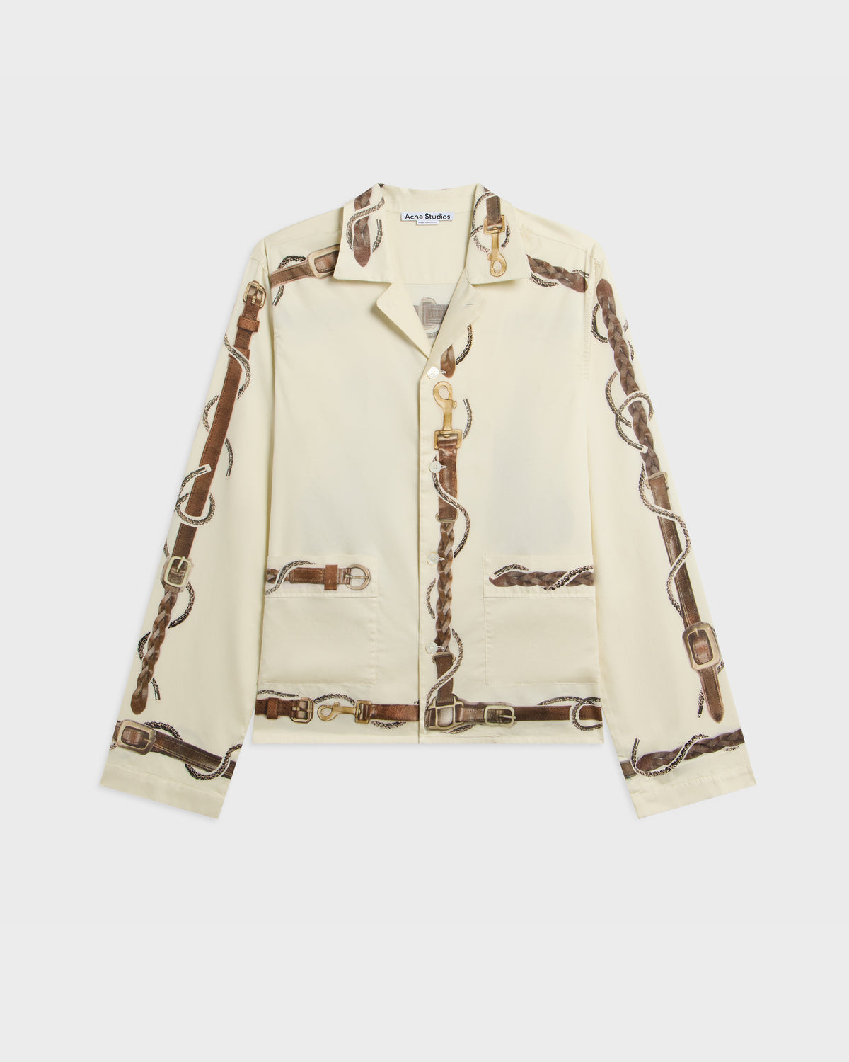 Acne Studios cream button-up jacket with brown leather belt-buckle print along sleeves and front, flat lay