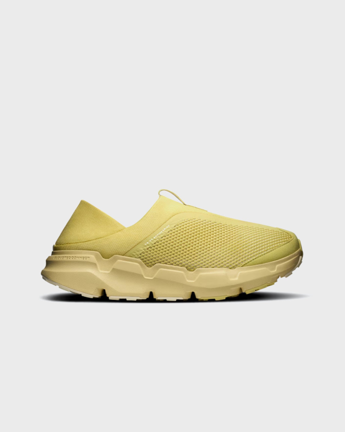 On Running slip-on sneaker in pale yellow mesh with chunky lugged sole and Cloudtec Connect midsole, side view