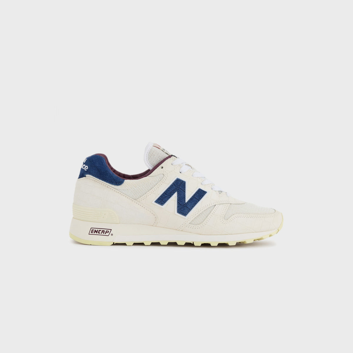 New Balance Made in USA 1300 sneaker in Angora with Blue Oyster suede accents and Mulled Wine trim, lateral side view