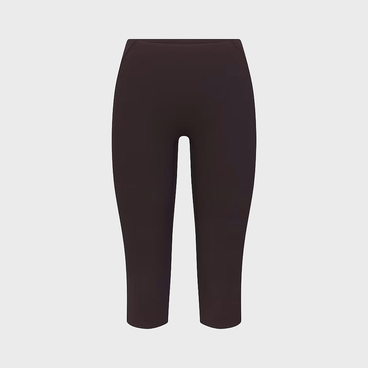 NikeSKIMS Studio Stretch Capri Legging in Dark Roast, deep brown cropped capri-length legging, front flat lay