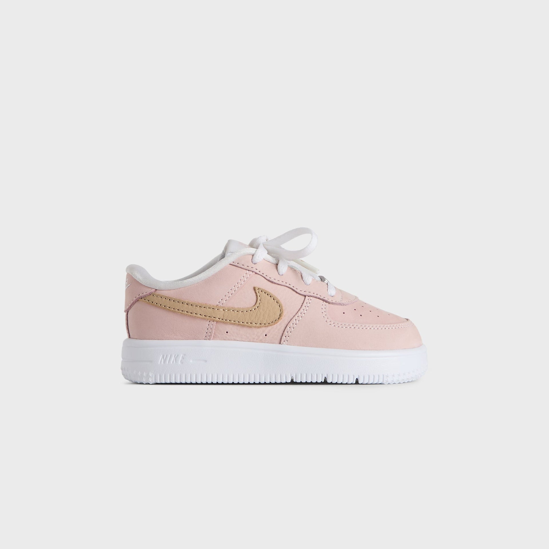 Kith Kids x Nike TD Air Force 1 Un-Linen, Atmosphere-pink leather with wheat suede Nike Swoosh and white sole, outer side profile