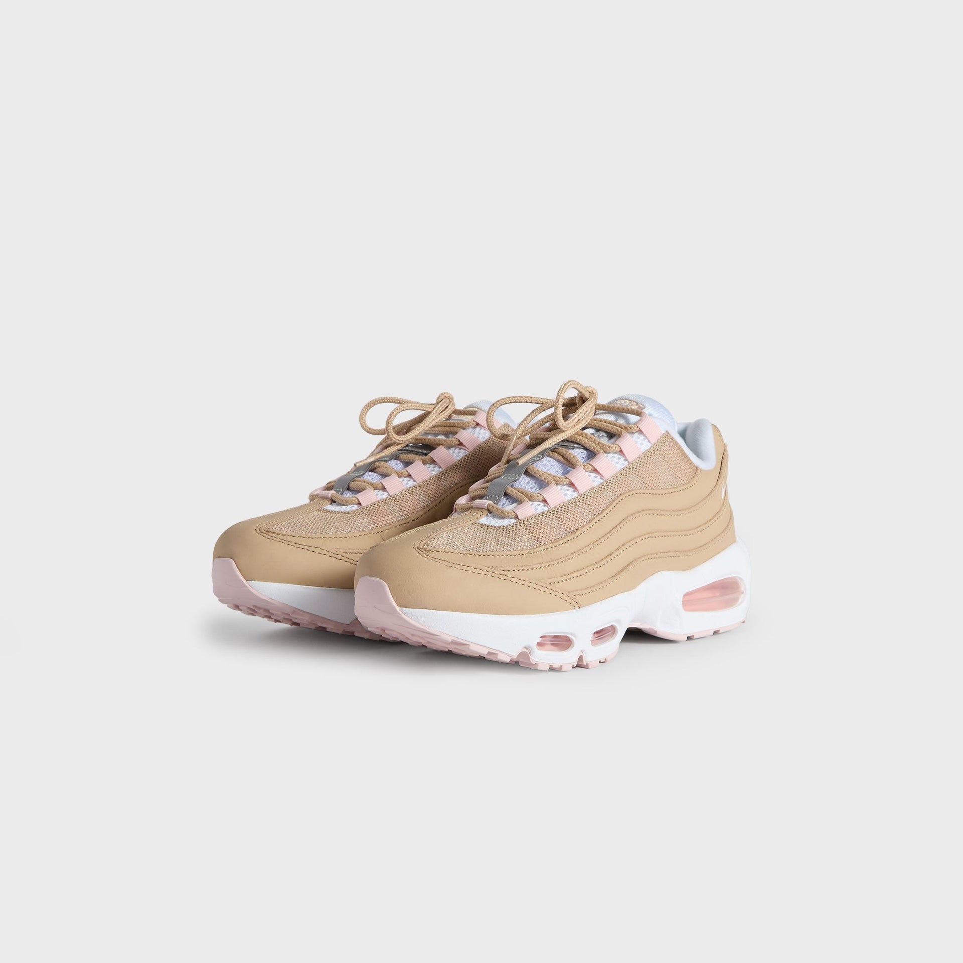 Kith Kids x Nike GS Air Max 95 Linen pair angled from the front, linen upper with pink accents and tan laces