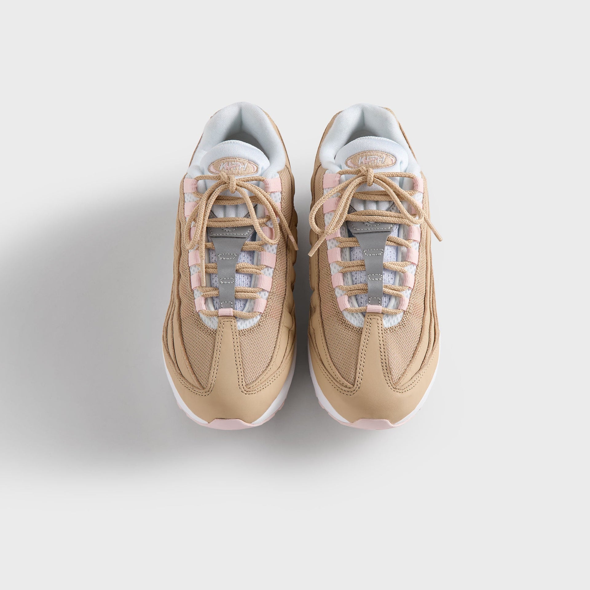Kith Kids x Nike GS Air Max 95 Linen pair from above, tan laces over pink-and-white tongues