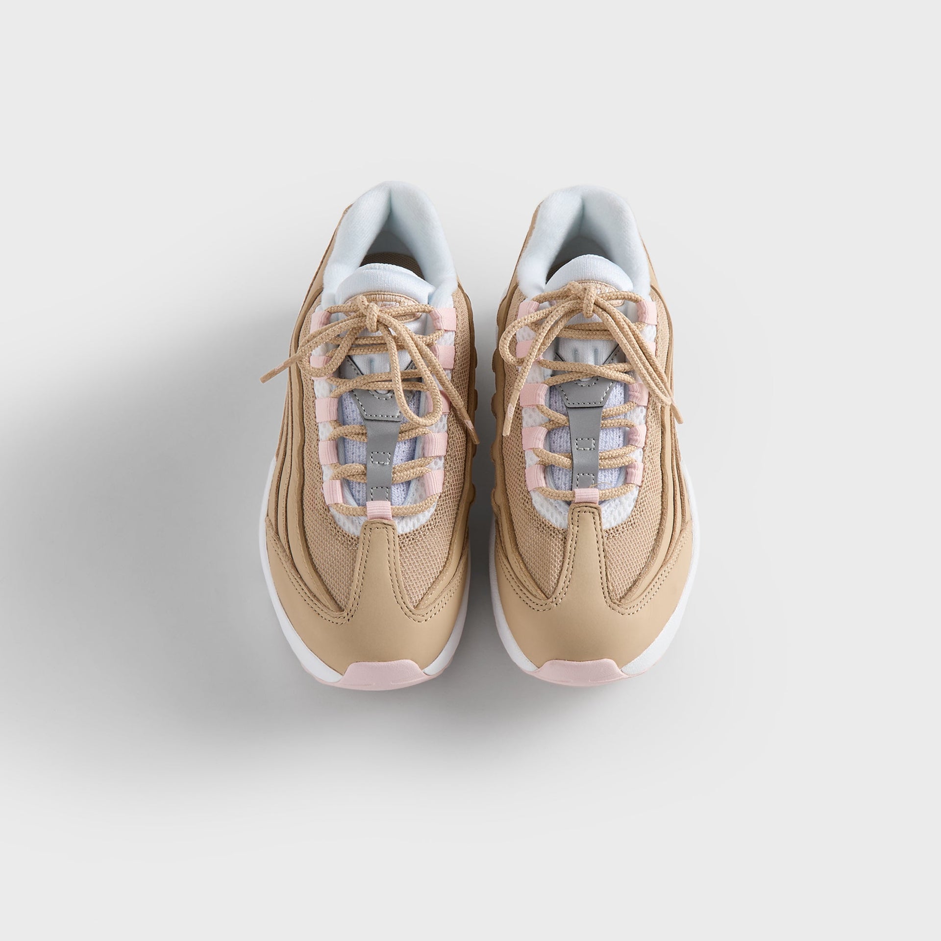 Kith Kids x Nike PS Air Max 95 Linen pair from above, tan laces over pink-and-white tongues