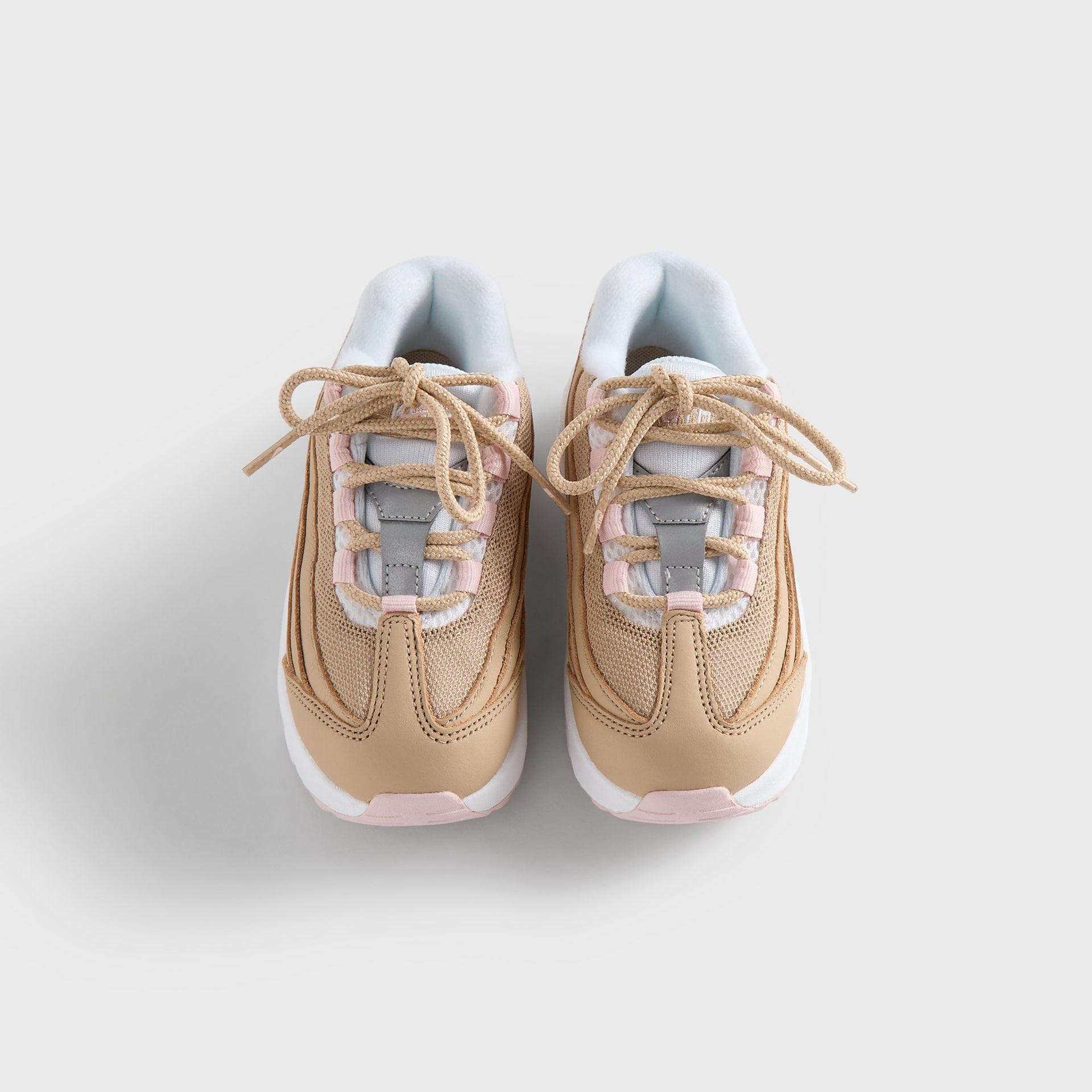 Kith Kids x Nike TD Air Max 95 Linen pair from above, tan laces over pink-and-white tongues