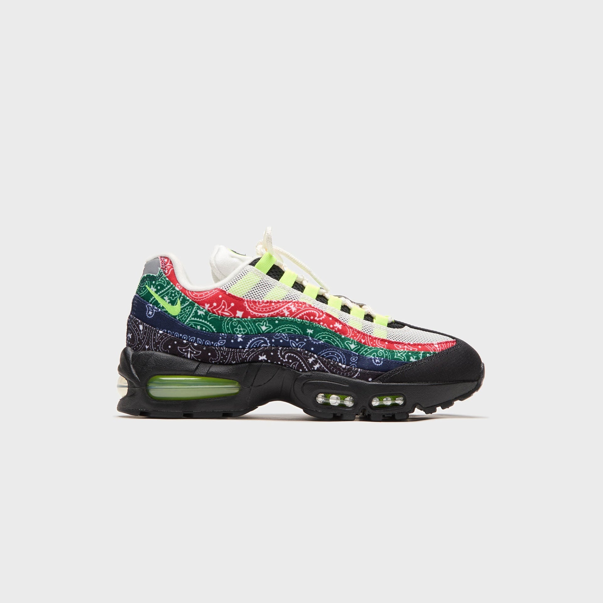 Kith x Nike Air Max 95 bandana, lateral view with red, green and navy paisley panels and volt swoosh