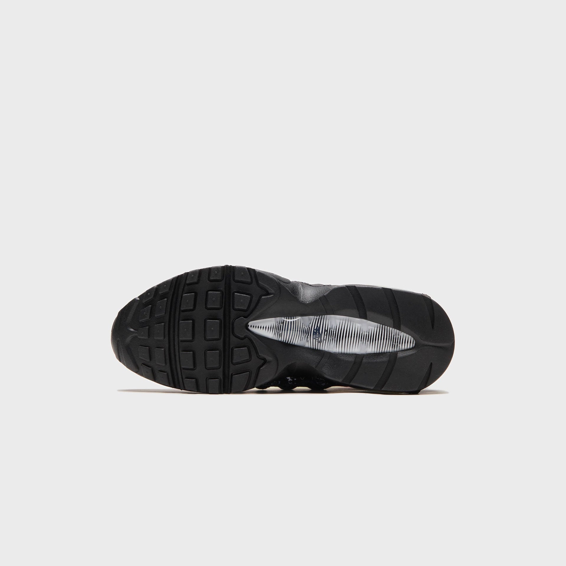 Kith x Nike Air Max 95 outsole, all-black rubber sole with the visible Air unit window