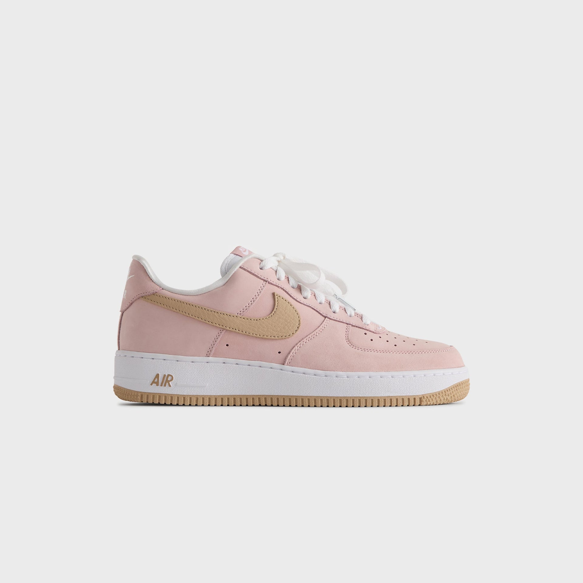Kith for Nike Air Force 1 'Un-Linen' lateral profile: pink suede upper, tan swoosh, white midsole and gum sole