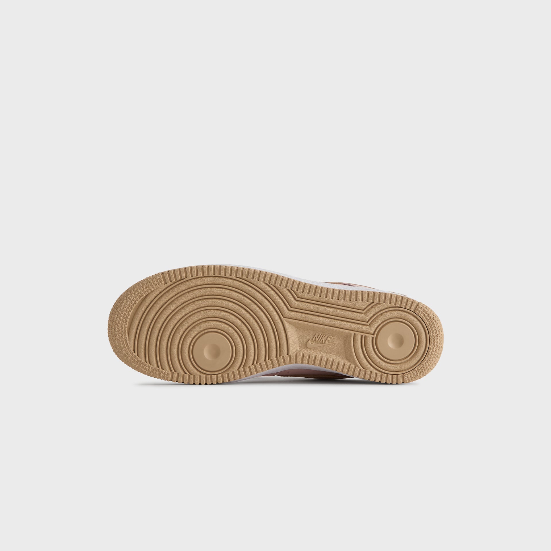 Gum rubber outsole of the Kith x Nike Air Force 1 Un-Linen, seen from below