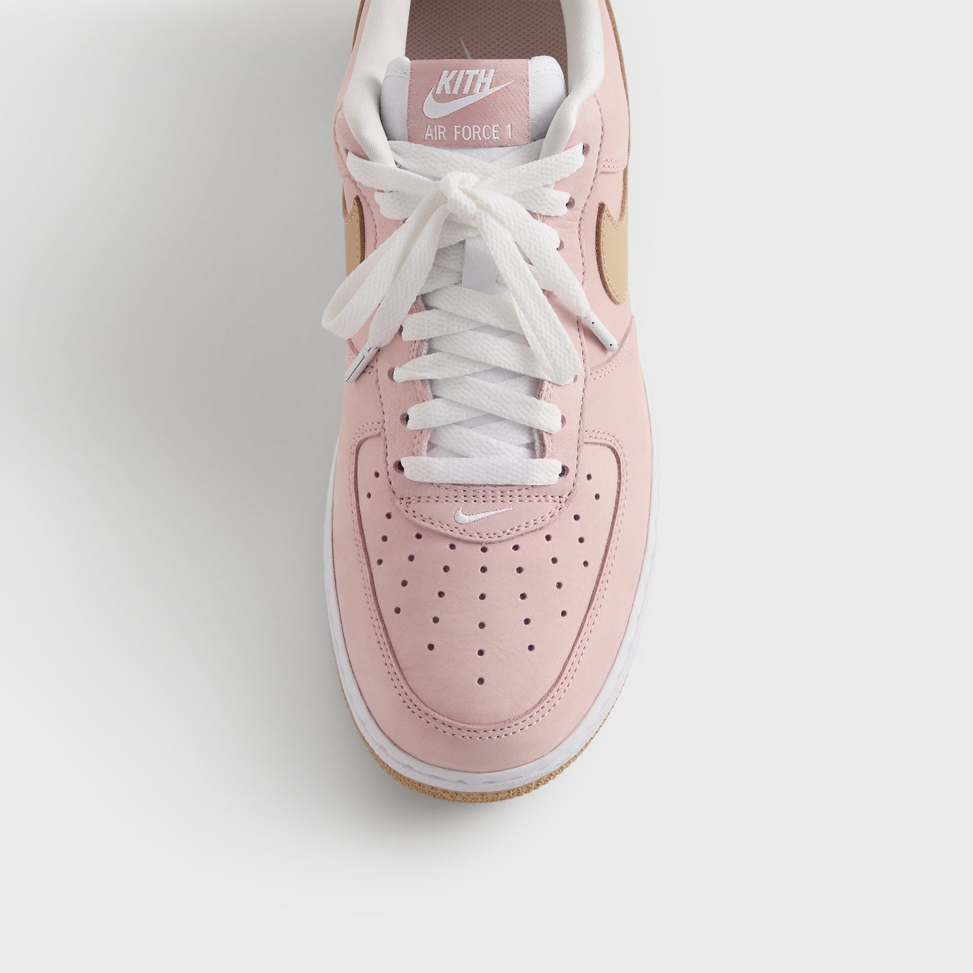 Kith for Nike Air Force 1 'Un-Linen' toe and tongue close-up with Kith Air Force 1 tag and white laces