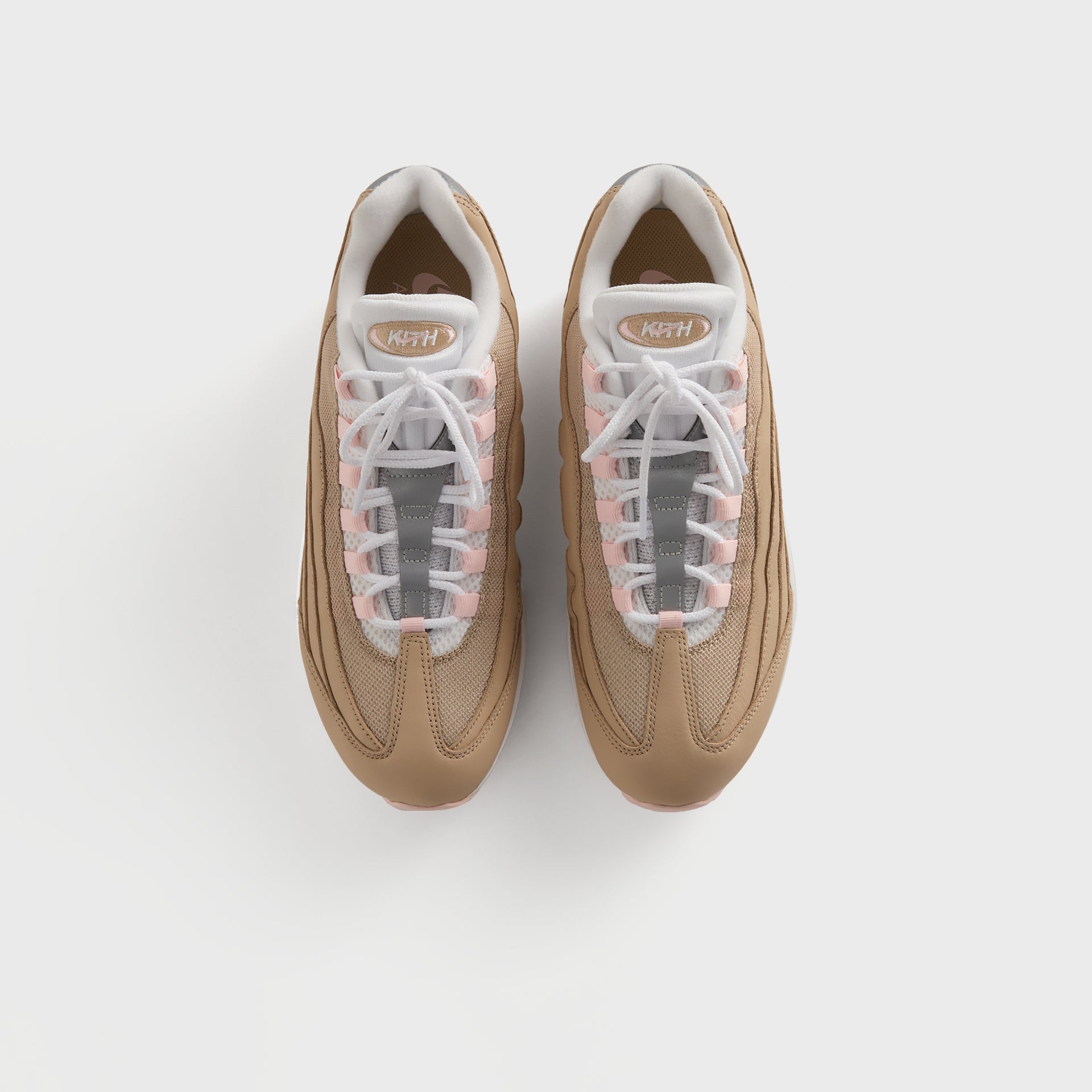Kith x Nike Air Max 95 Linen pair from above, white laces over pink-and-white tongues