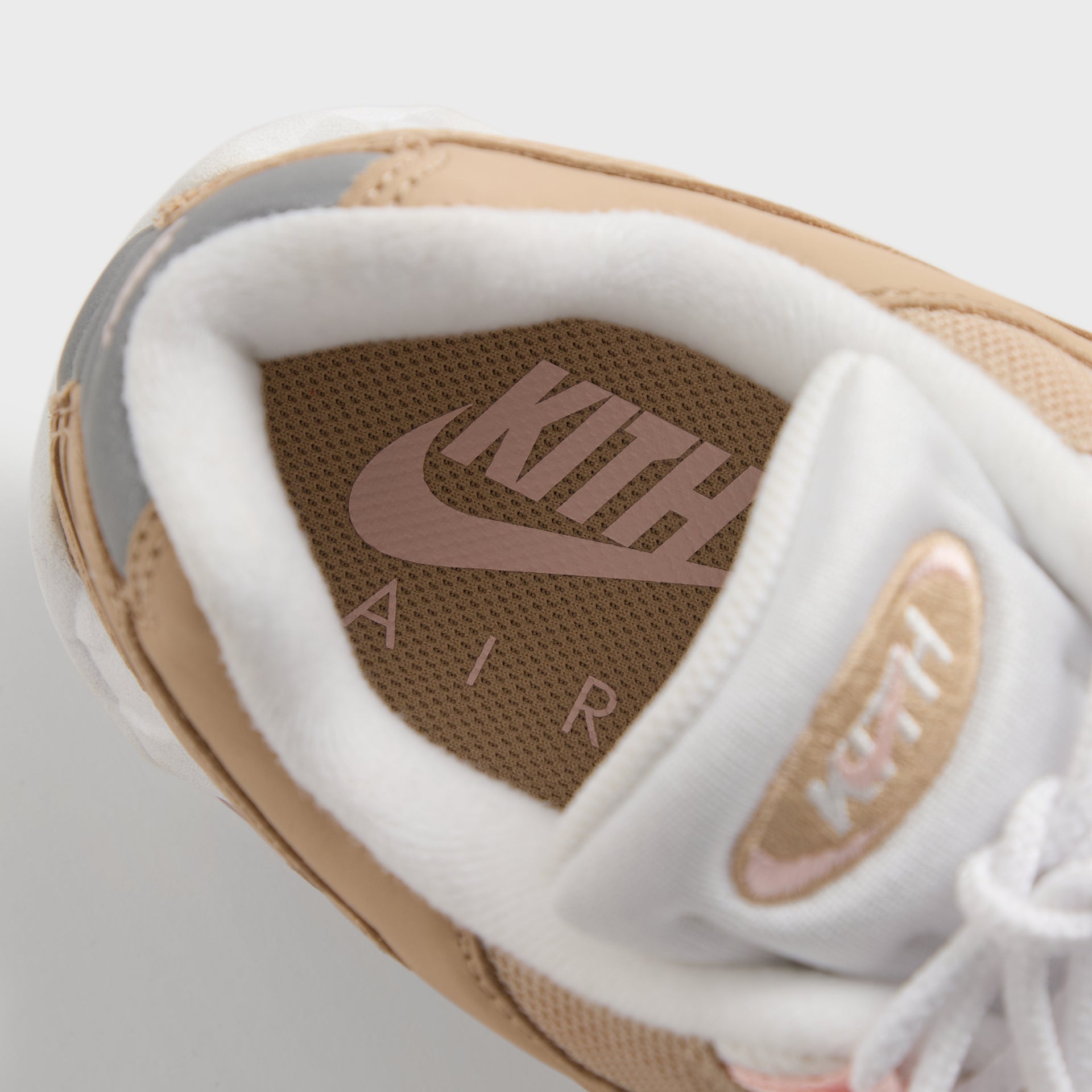 Insole of the Kith x Nike Air Max 95 Linen with Kith and Nike Air branding, blue lining