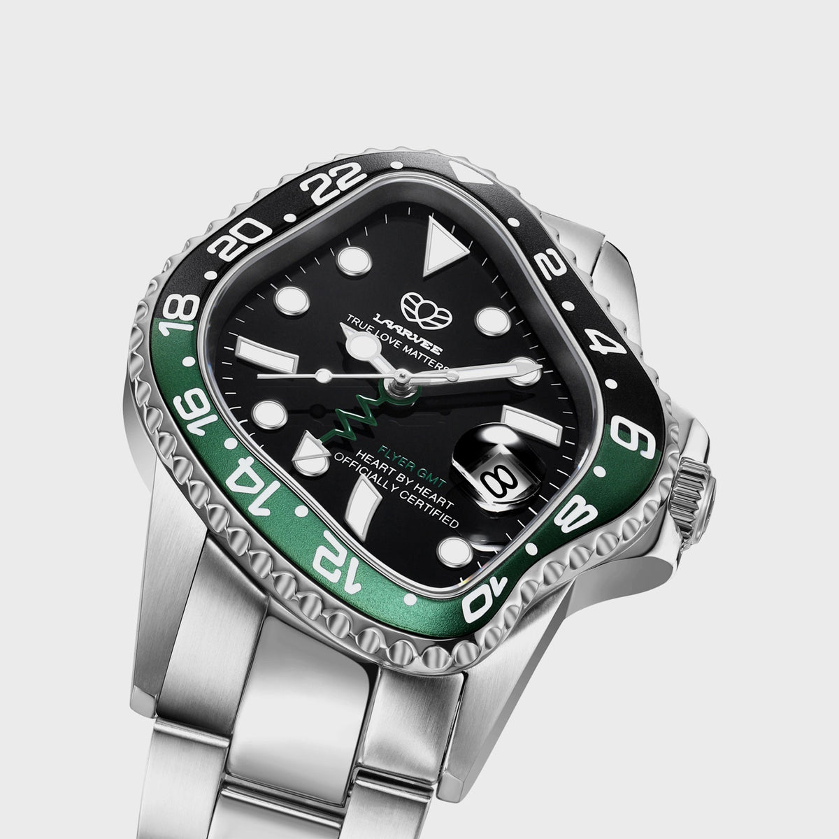 LAARVEE Silver Precision Steel watch with black and green GMT bezel, close-up angled dial view