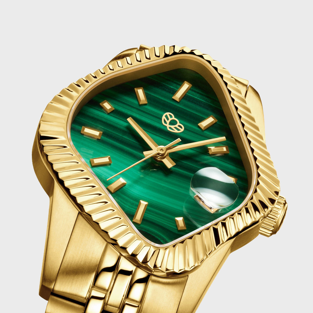 LAARVEE Golden Precision Steel watch with fluted bezel and green malachite dial, close-up angled dial view