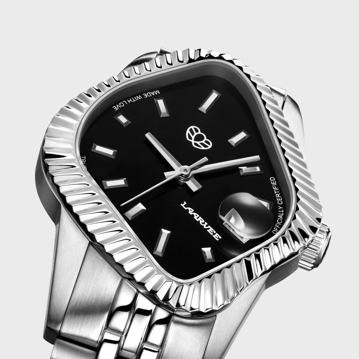 LAARVEE Silver Precision Steel watch with fluted bezel and black dial, close-up angled dial view