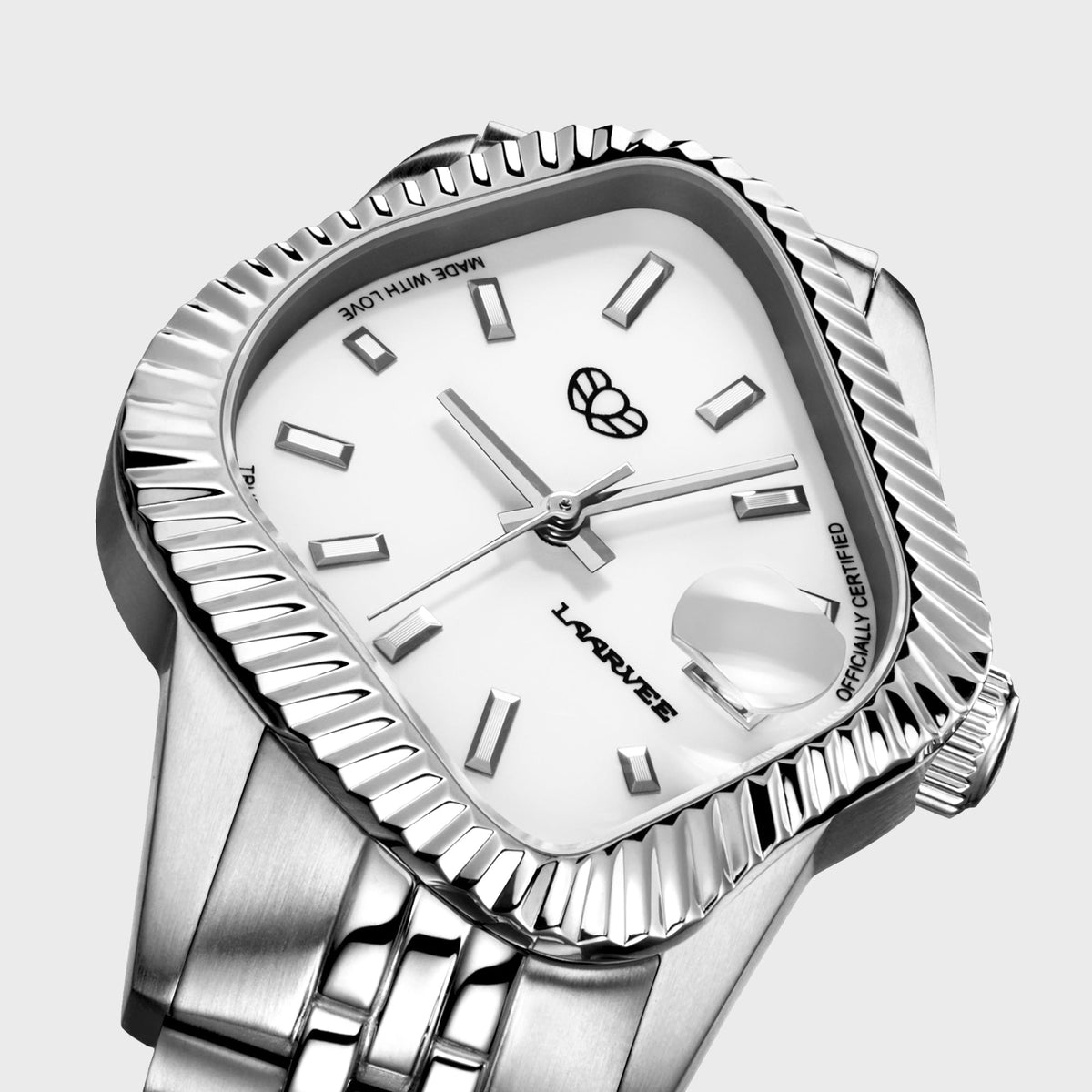 LAARVEE Silver Precision Steel watch with fluted bezel and white dial, close-up angled dial view