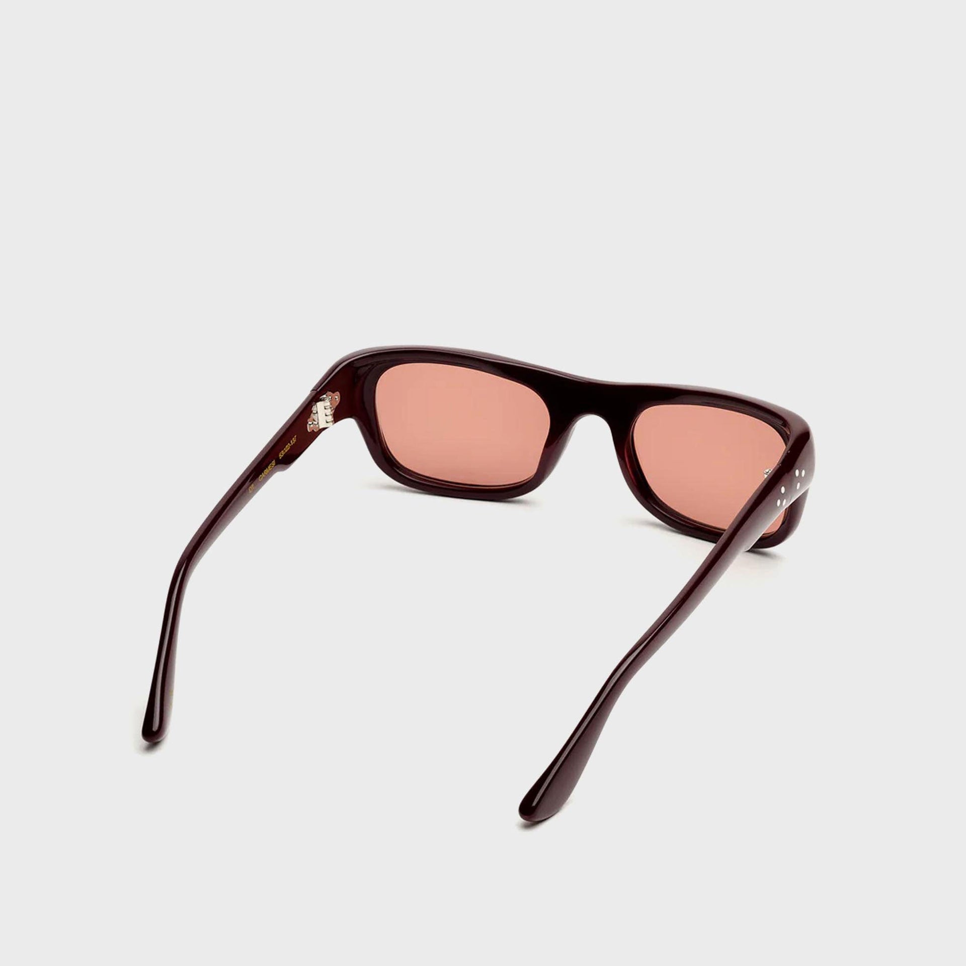 Port Tanger Dil burgundy sunglasses, rear three-quarter view showing inner temples and rose-tinted lenses