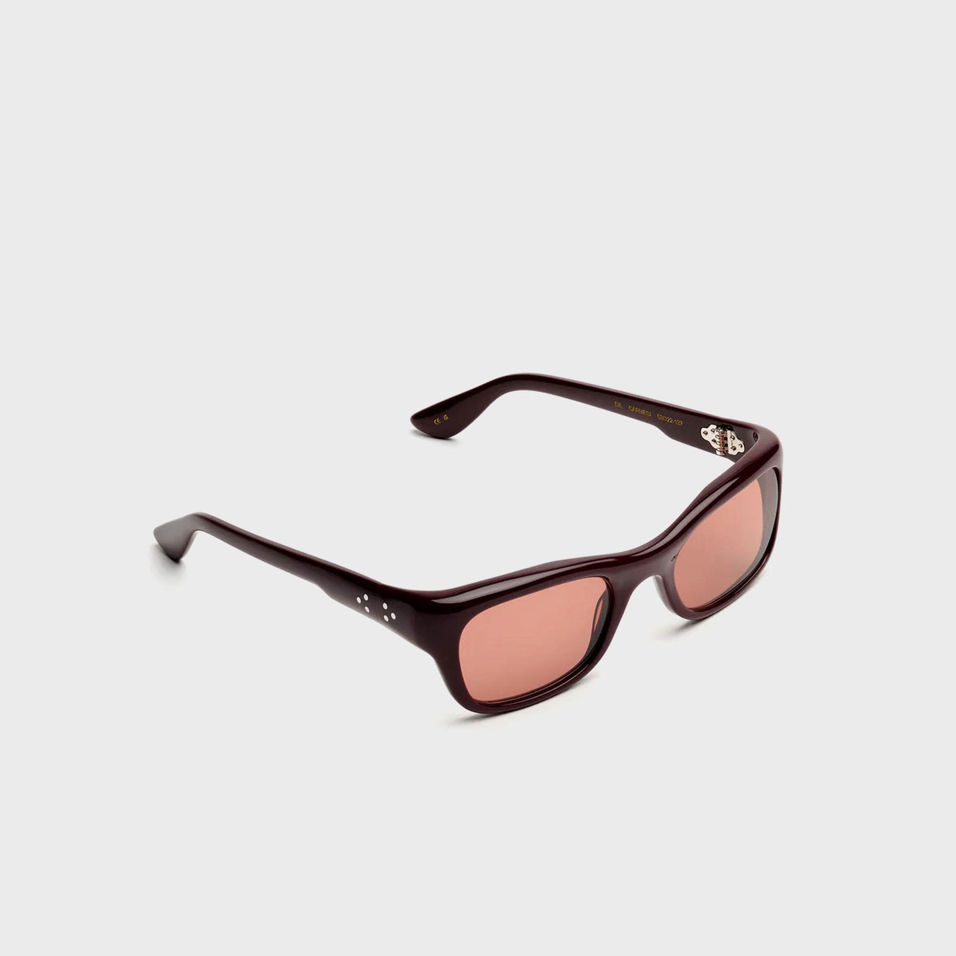 Port Tanger Dil Carmesi acetate sunglasses, front three-quarter angle with tobacco lenses and rivet detail