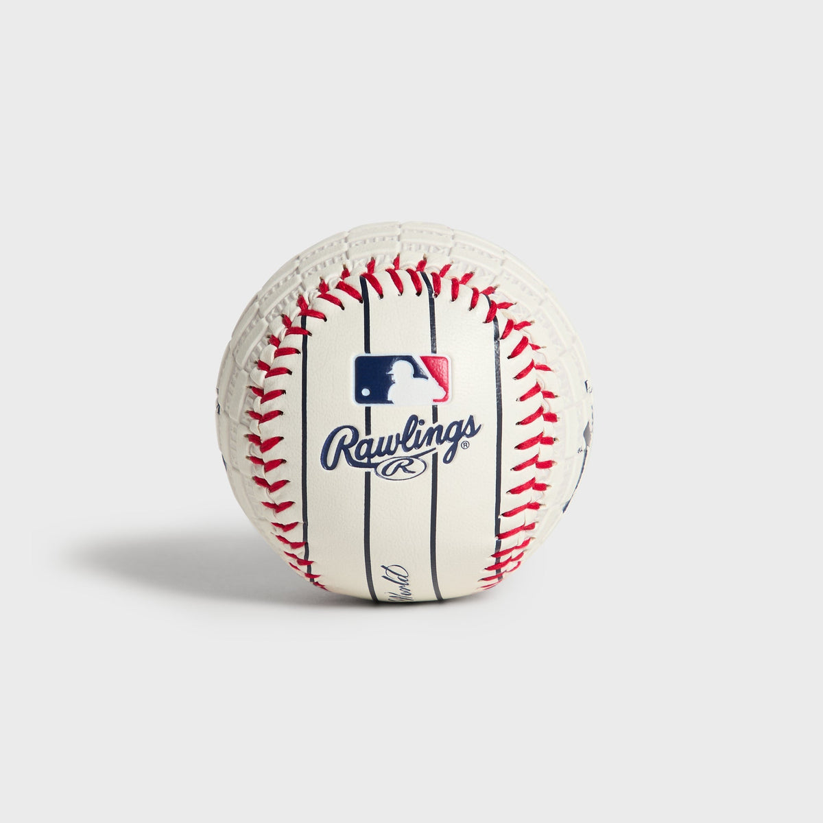 Kith & Rawlings Commemorative Baseball - front view showing Rawlings and MLB logos on pinstripe panel