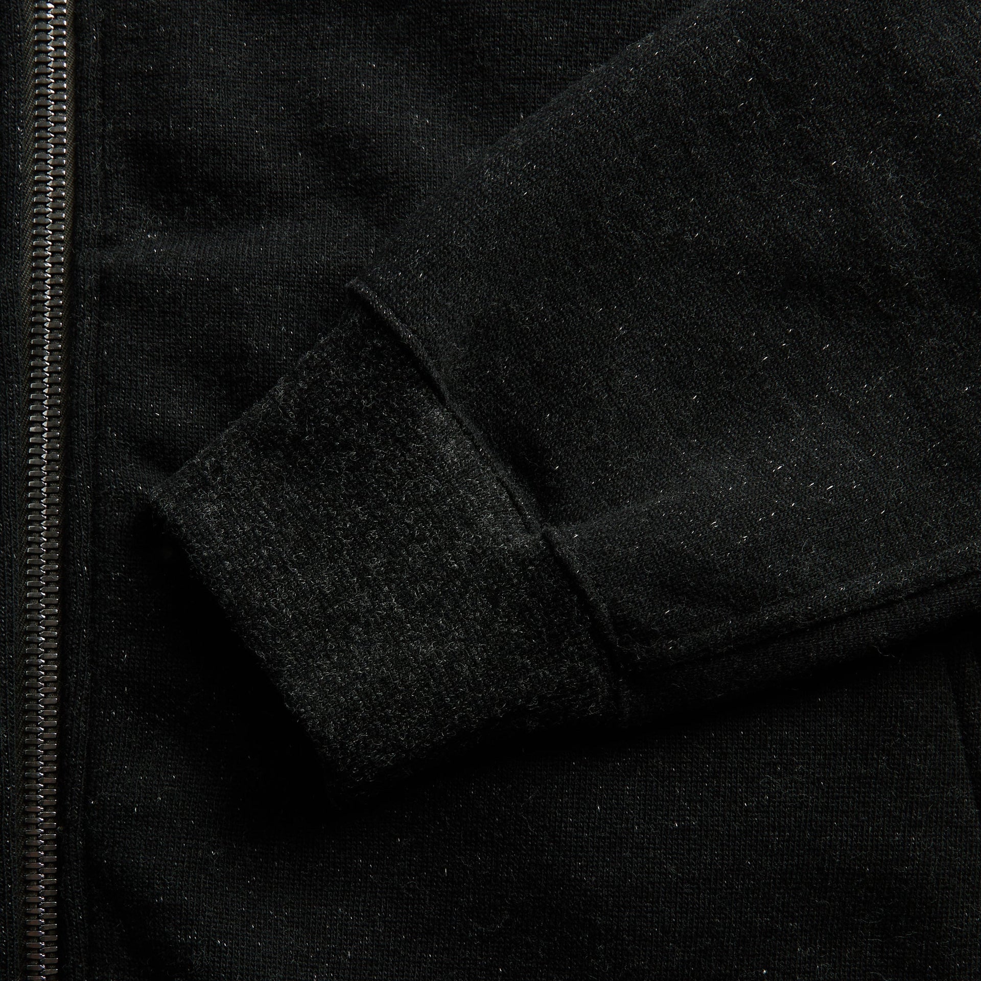 Stone Island tonal compass badge detail embroidered on navy knit polo sleeve