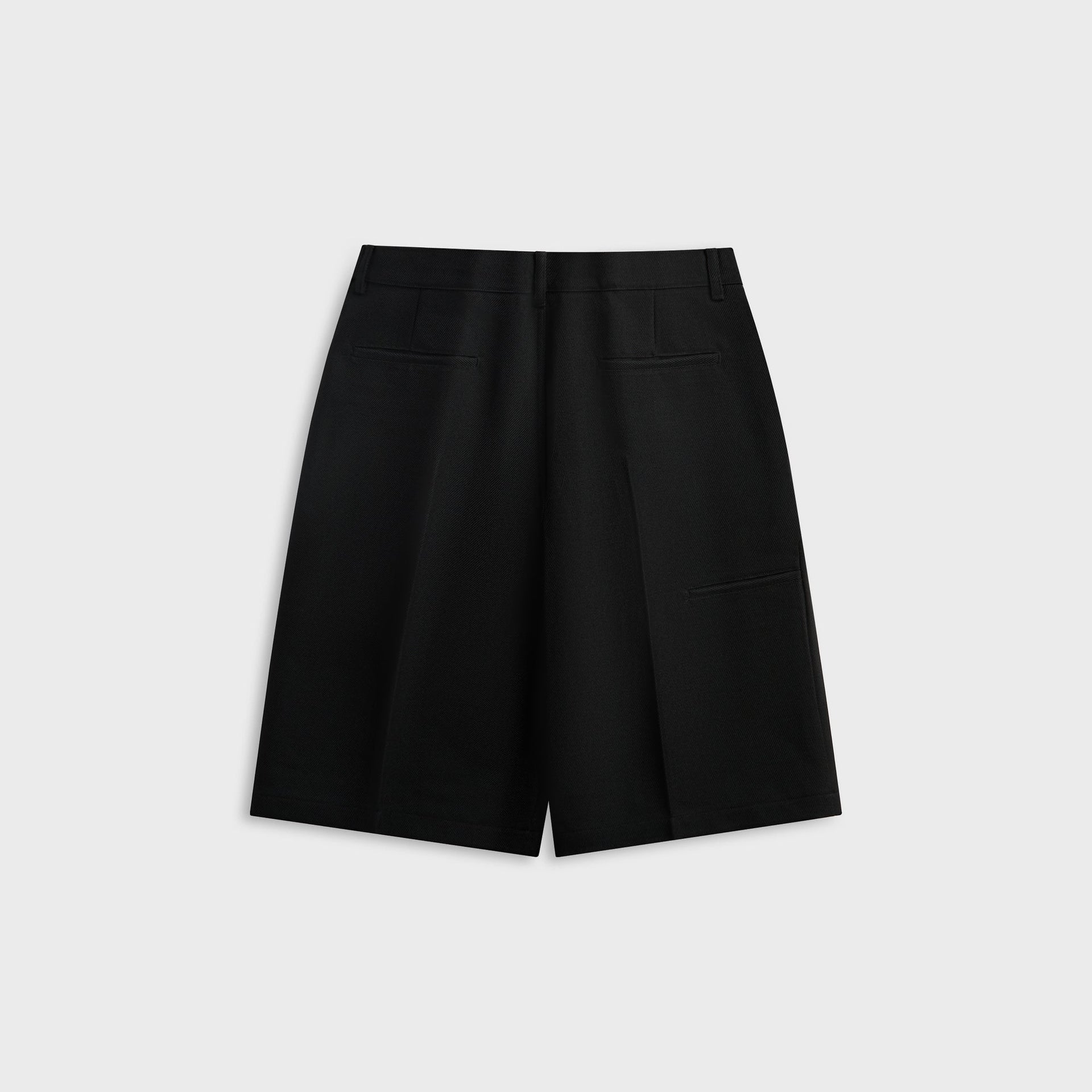 Rick Owens Work Short in black, back detail of twill weave and welt pocket on wide-leg shorts