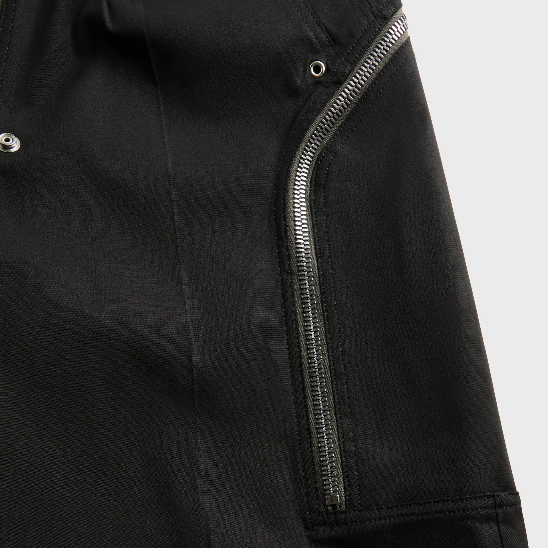 Stone Island denim detail, back pocket, orange contrast stitching and embossed compass leather patch