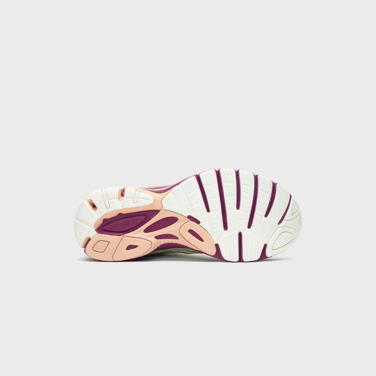 Outsole tread view of the Saucony x Stan Birch ProGrid Guide 7 in mauve, peach and cream rubber