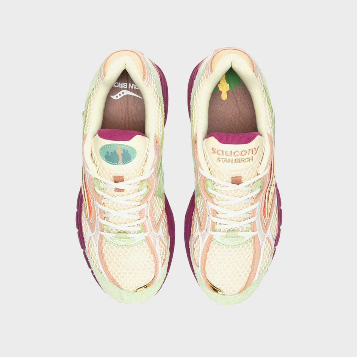 Pair of Saucony x Stan Birch ProGrid Guide 7 sneakers from above, showing Stan Birch branded tongue labels