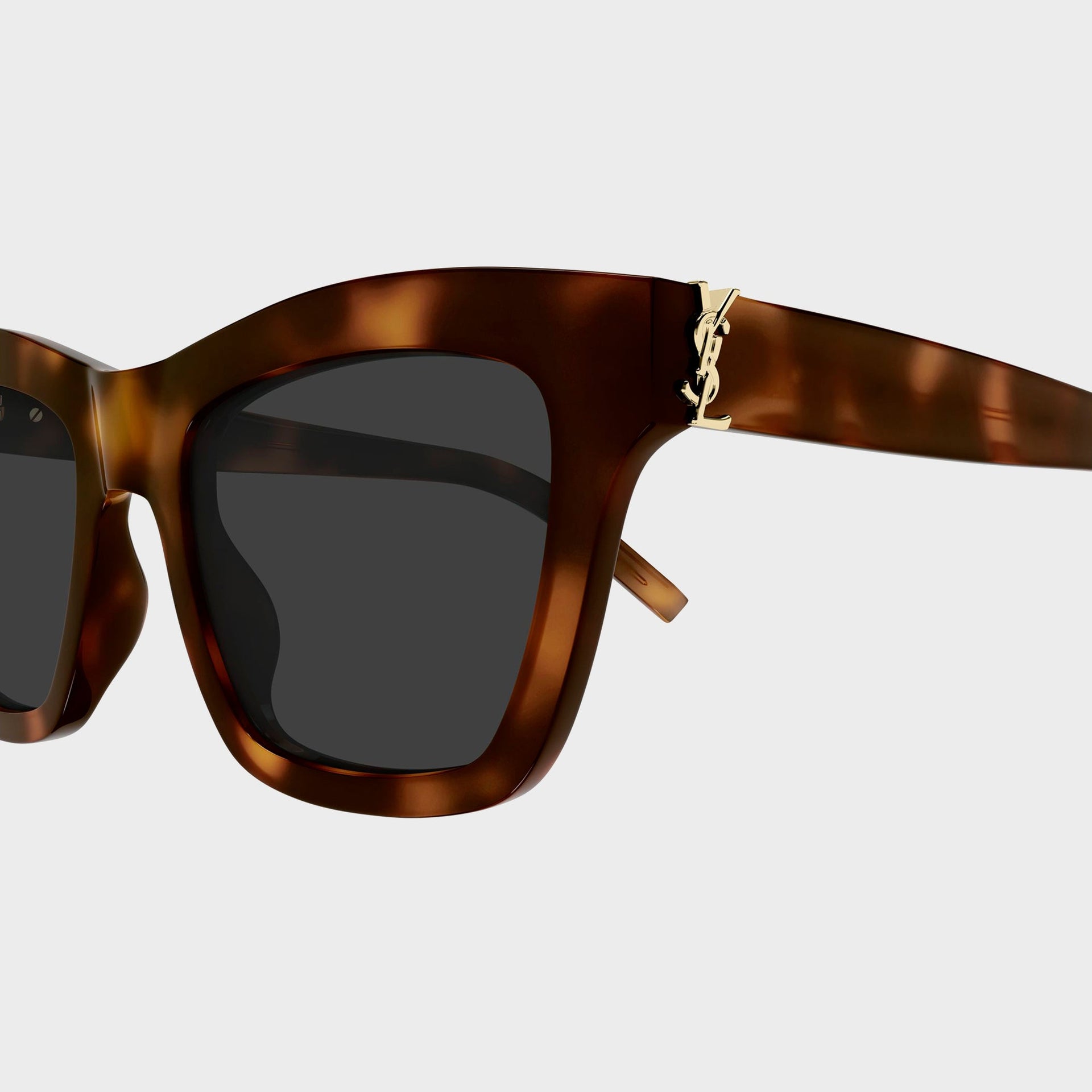 Saint Laurent SLM156 cat-eye sunglasses in Havana tortoiseshell, close-up of gold YSL monogram at temple