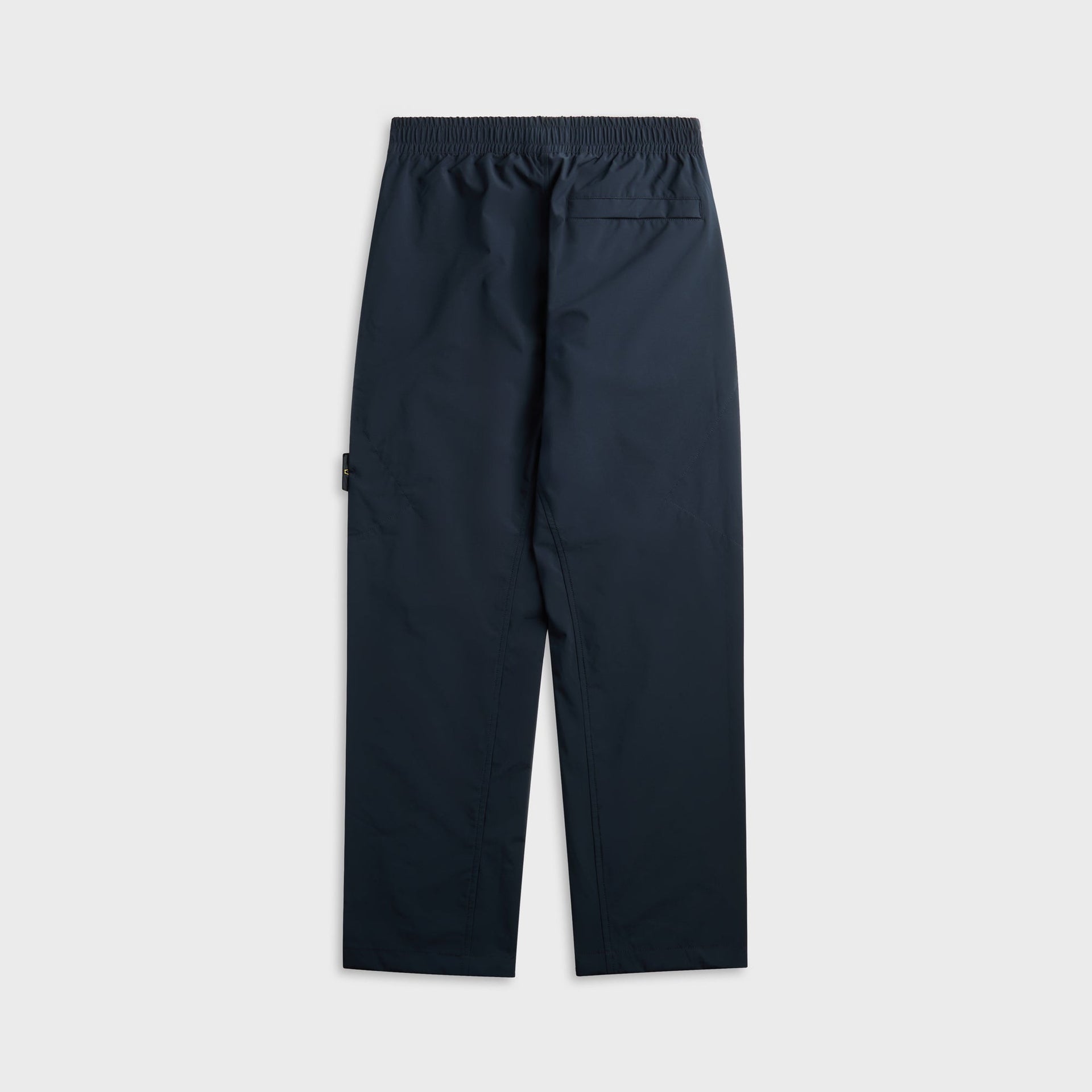 Stone Island navy Soft Shell-R technical trouser, back view with elastic waist and welt pocket