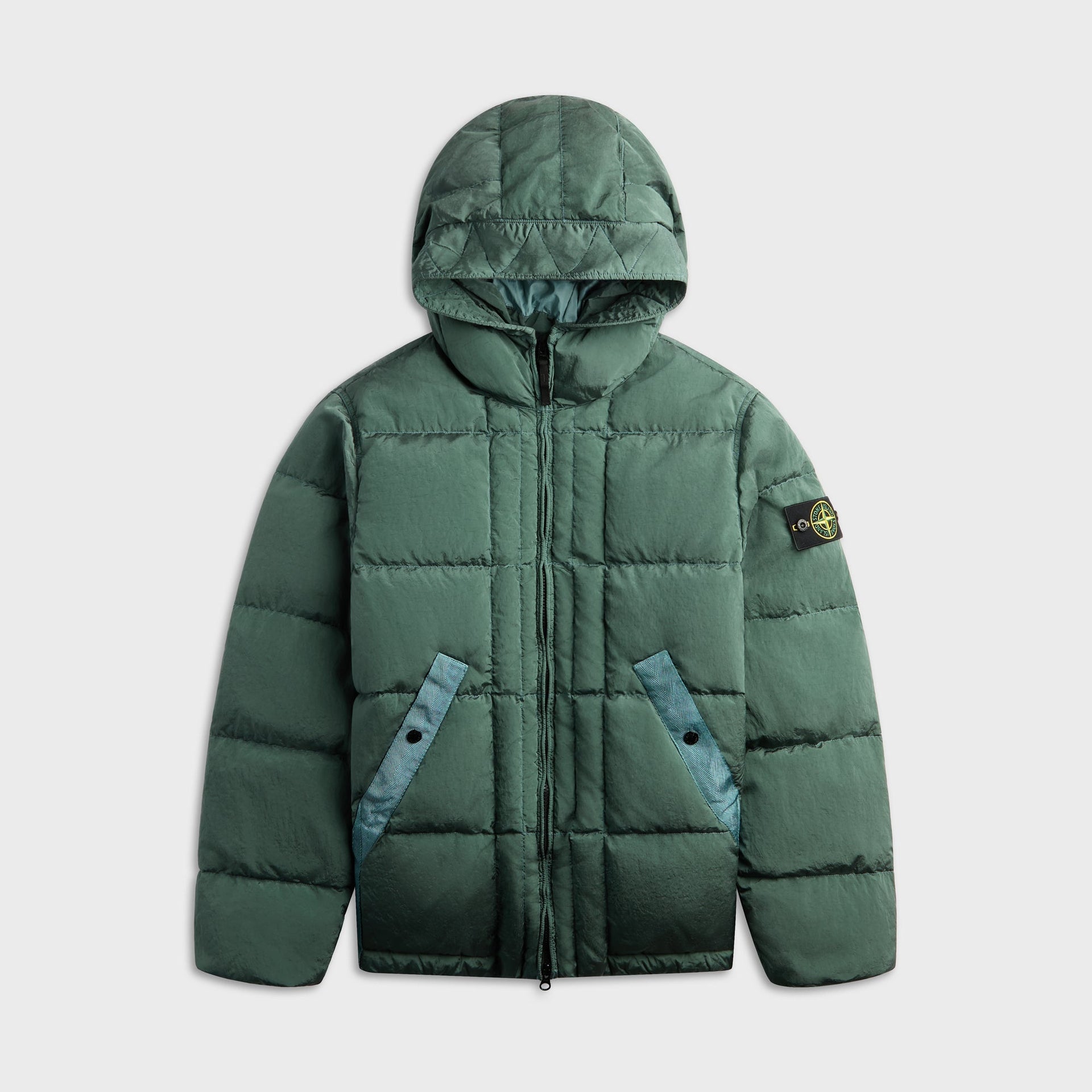 Stone Island padded zip-up jacket in ocean green, hooded front view with logo patch on sleeve