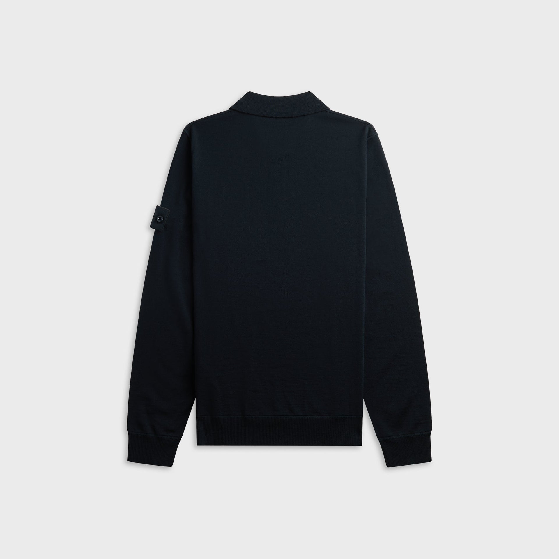 Navy Stone Island long-sleeve knit polo, back view with tonal sleeve badge