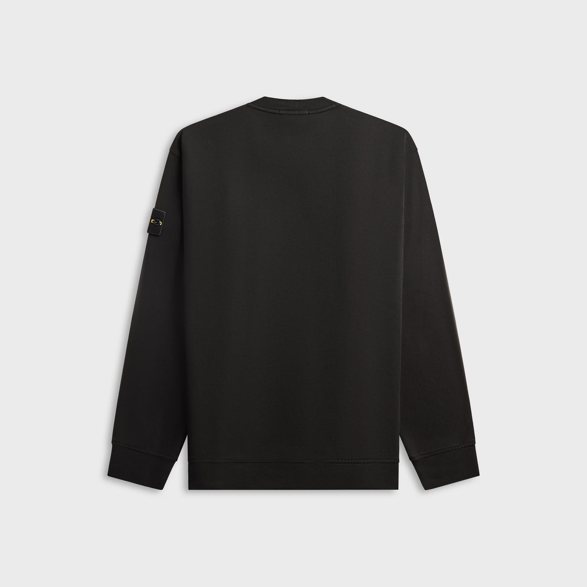 Stone Island black organic cotton crewneck sweatshirt, back view with tonal compass badge on sleeve