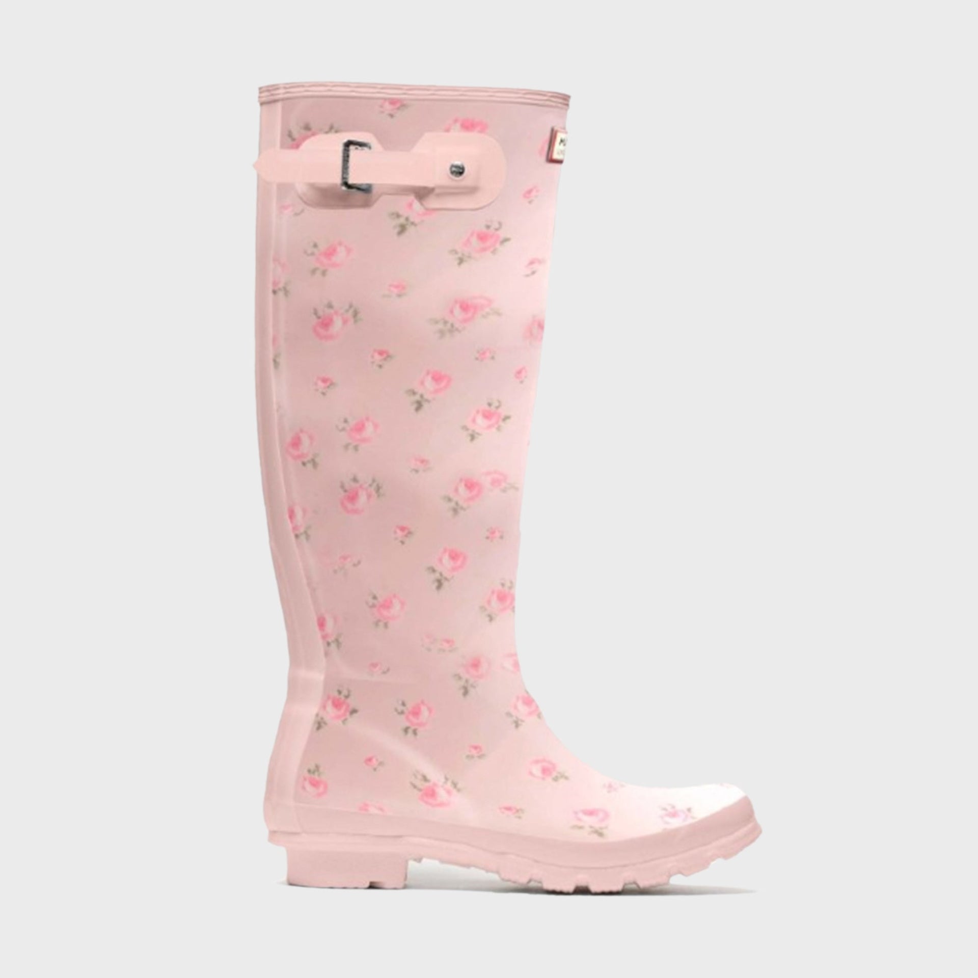Hunter x LoveShackFancy women's Original Tall rain boot in pale pink with pink rose ditsy print and buckle strap, side view