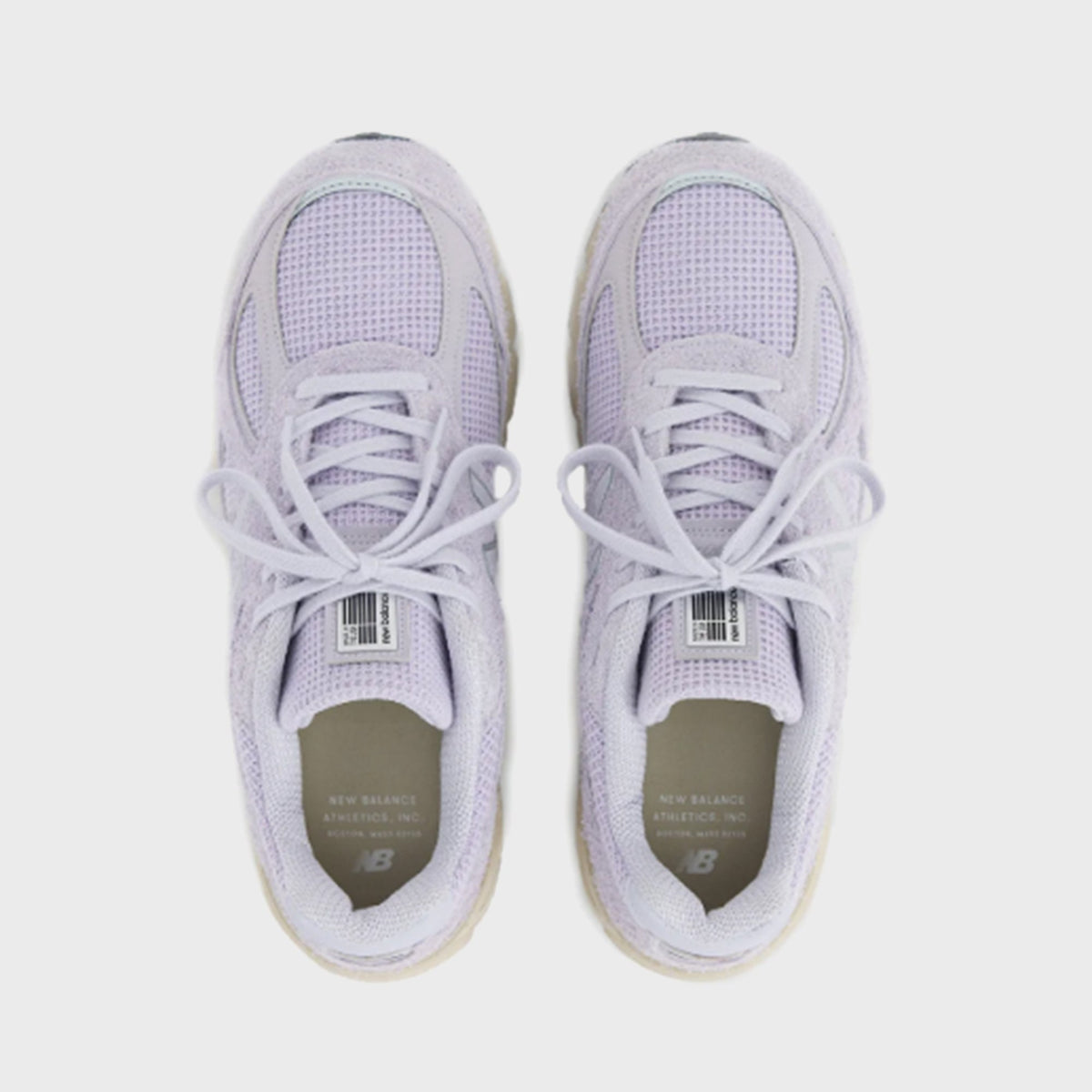 New Balance 990v4 Made in USA sneaker in lavender suede and mesh, top-down view of pair