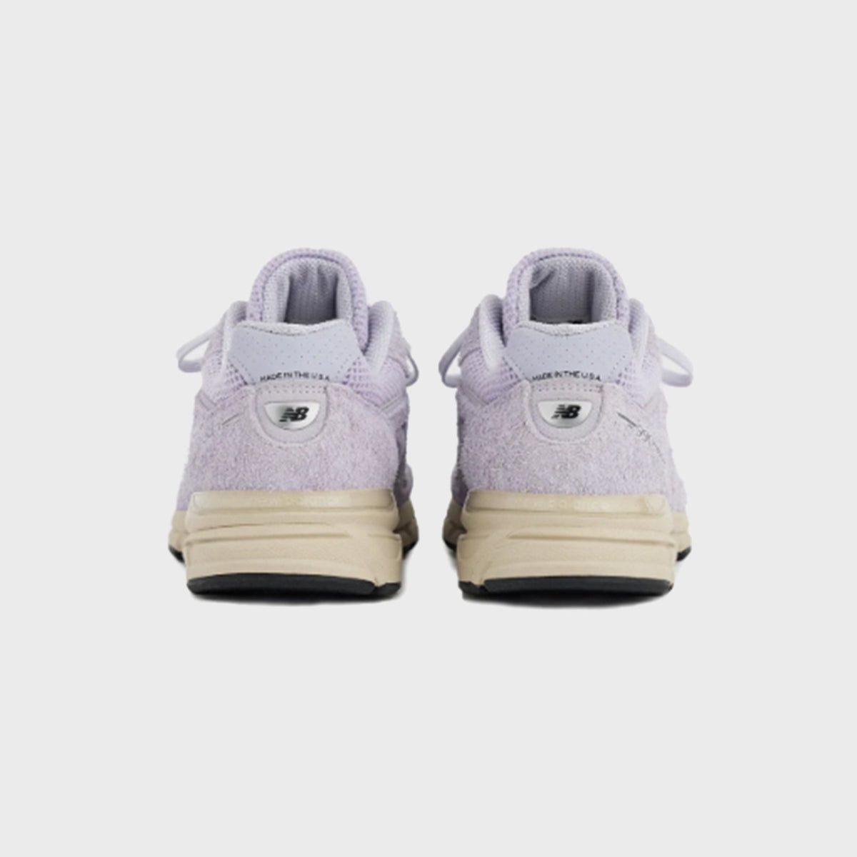 New Balance 990v4 Made in USA sneaker in lavender suede, rear heel view of pair