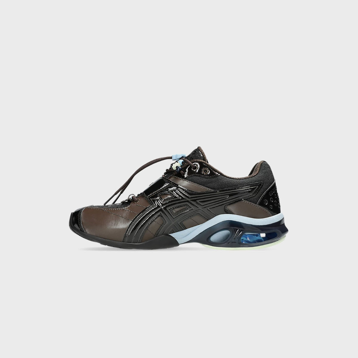ASICS x Cecilie Bahnsen GEL-KINETIC FR sneaker medial side view showing black patent overlay panels and visible gel cushioning