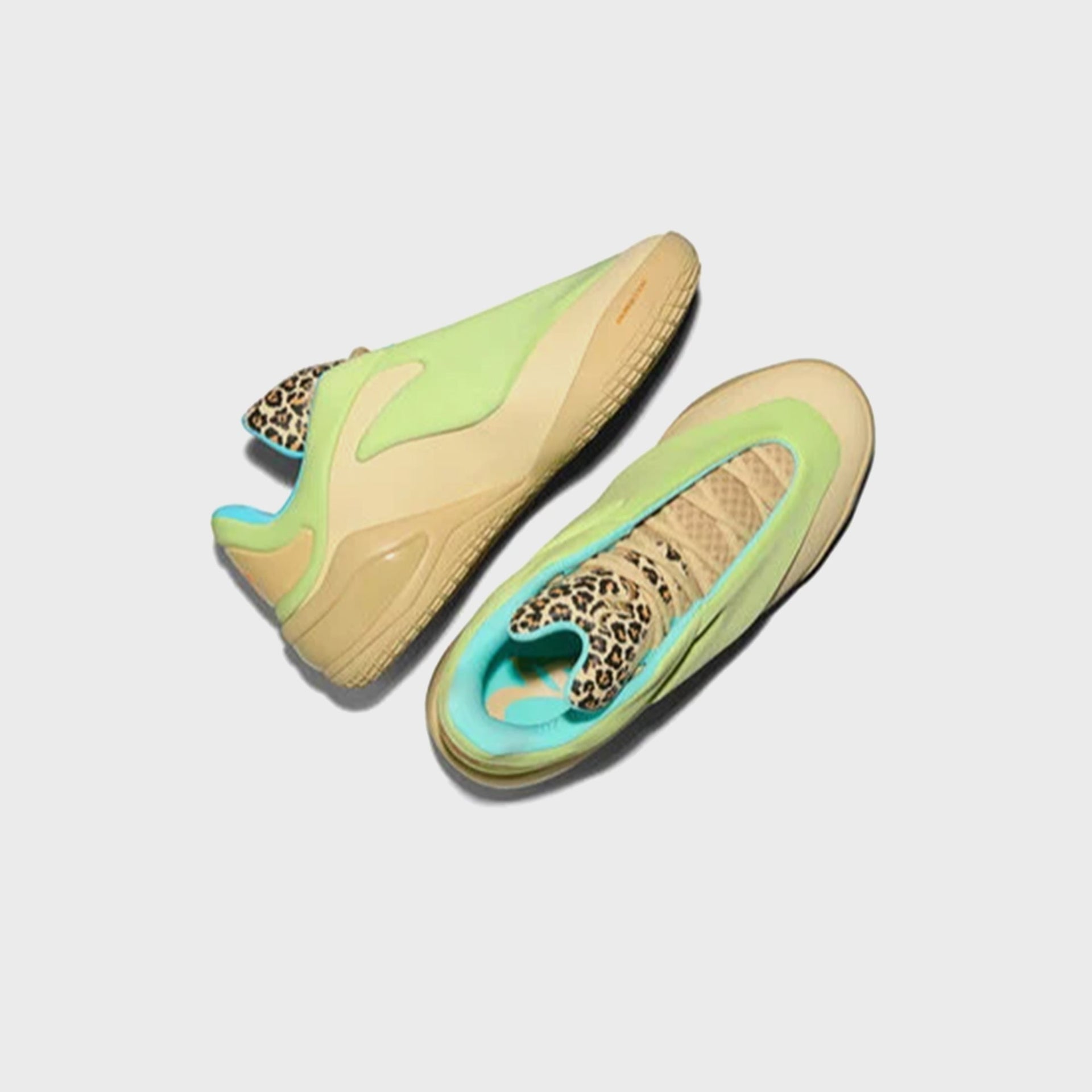 Converse SHAI 001 basketball sneaker in tan with turquoise lining, top-down view of pair