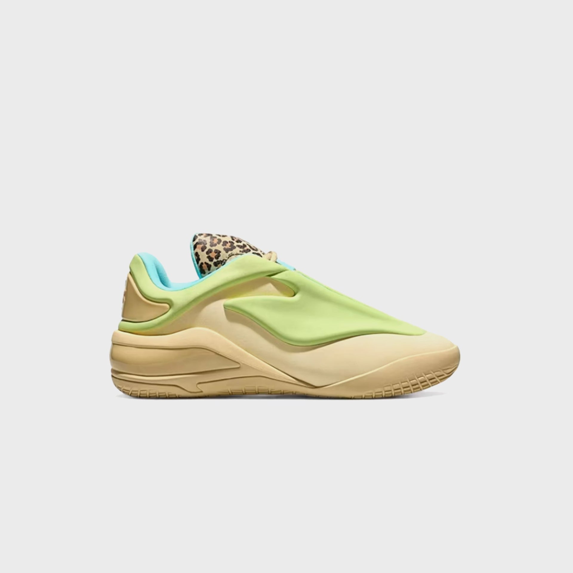 Converse SHAI 001 basketball sneaker in tan with lime green overlay and cheetah-print heel tab, side view