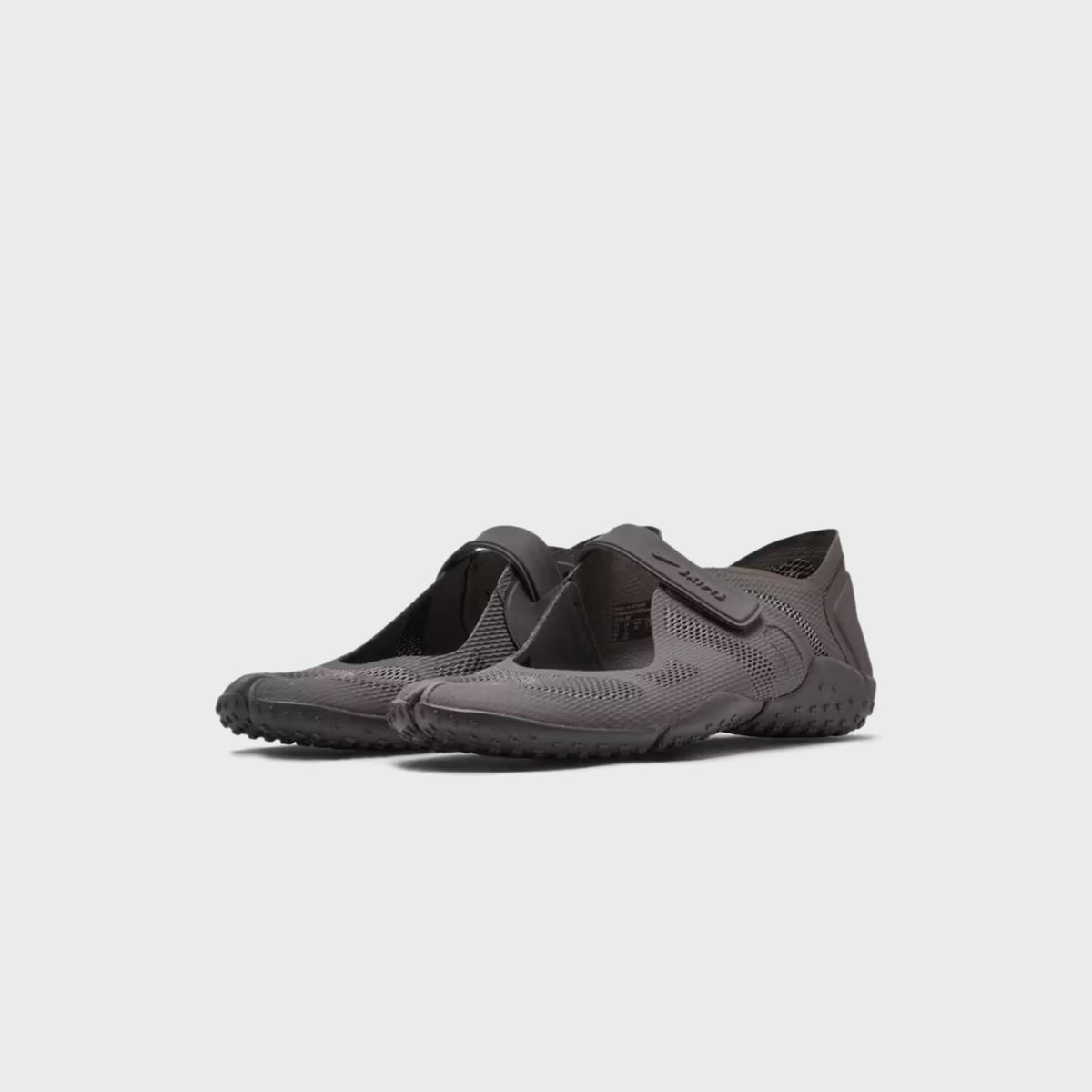 NikeSKIMS Rift 2 Tone Mesh sneakers in Cave Stone, front three-quarter view of the tonal mesh pair