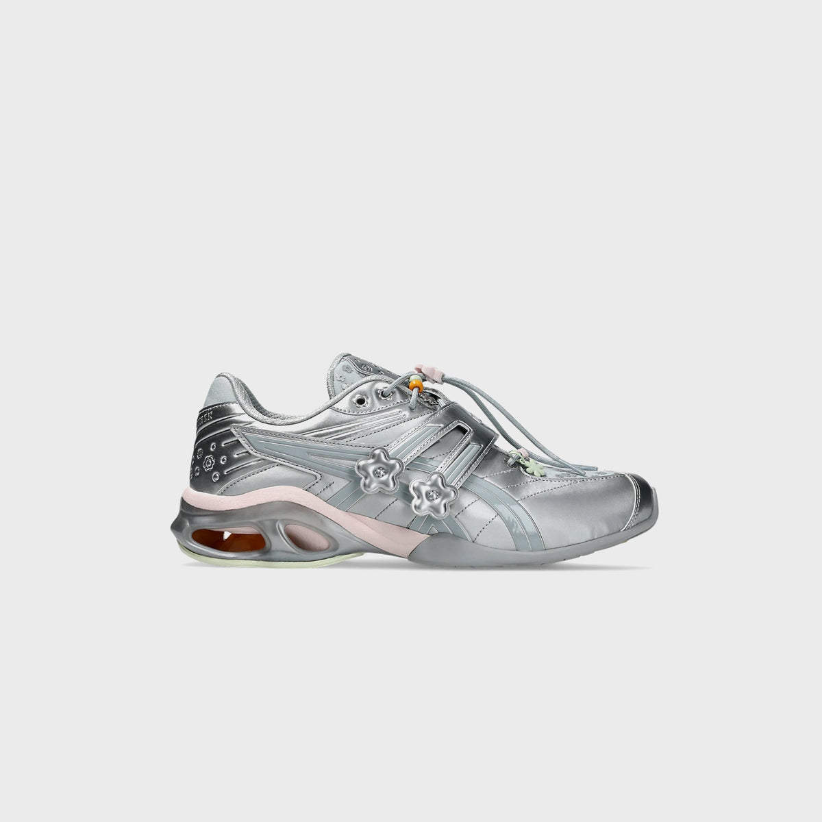 ASICS x Cecilie Bahnsen GEL-KINETIC FR sneaker in metallic silver with floral hardware, lateral side view