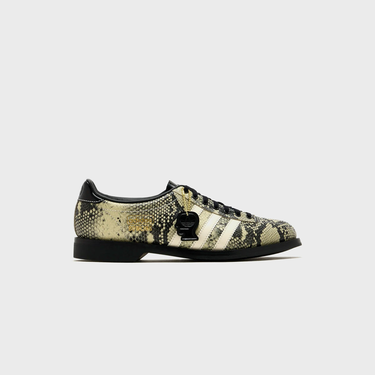 adidas x Brain Dead Samba Bowling shoe in Multi Color / Cream White / Core Black snakeskin-print leather, lateral view with cream three stripes and black Brain Dead charm