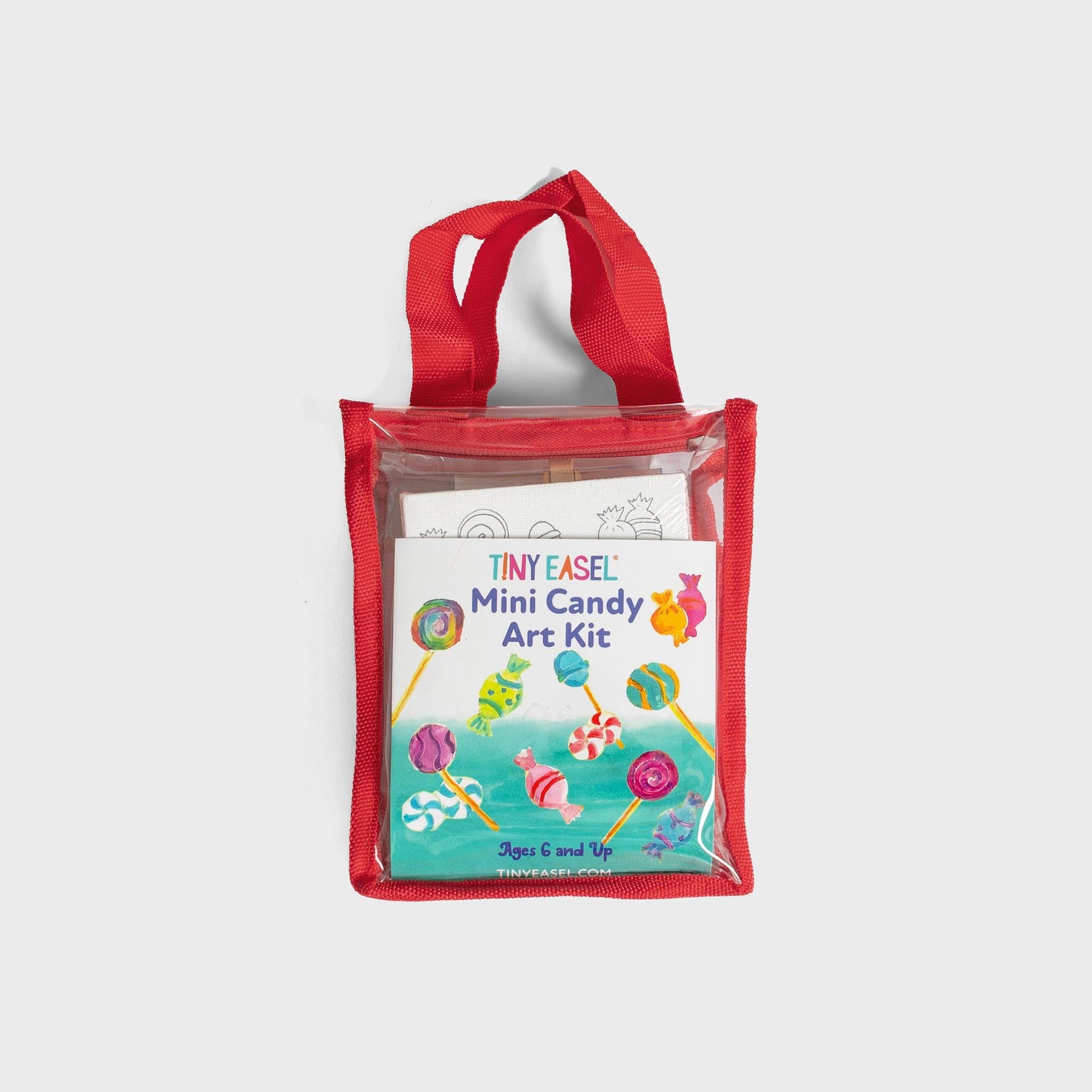 Tiny Easel Mini Candy Art Kit in clear red-trimmed tote, painted lollipops and candies, canvas and easel inside