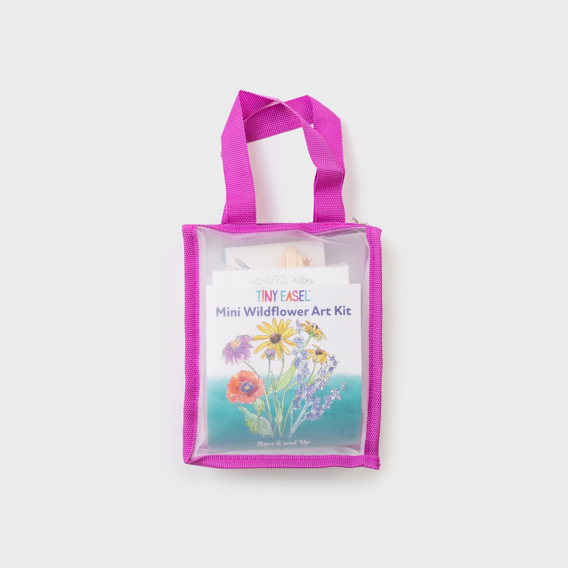 Tiny Easel Mini Wildflower Art Kit in clear mini tote with pink trim, front view of watercolor wildflower bouquet packaging