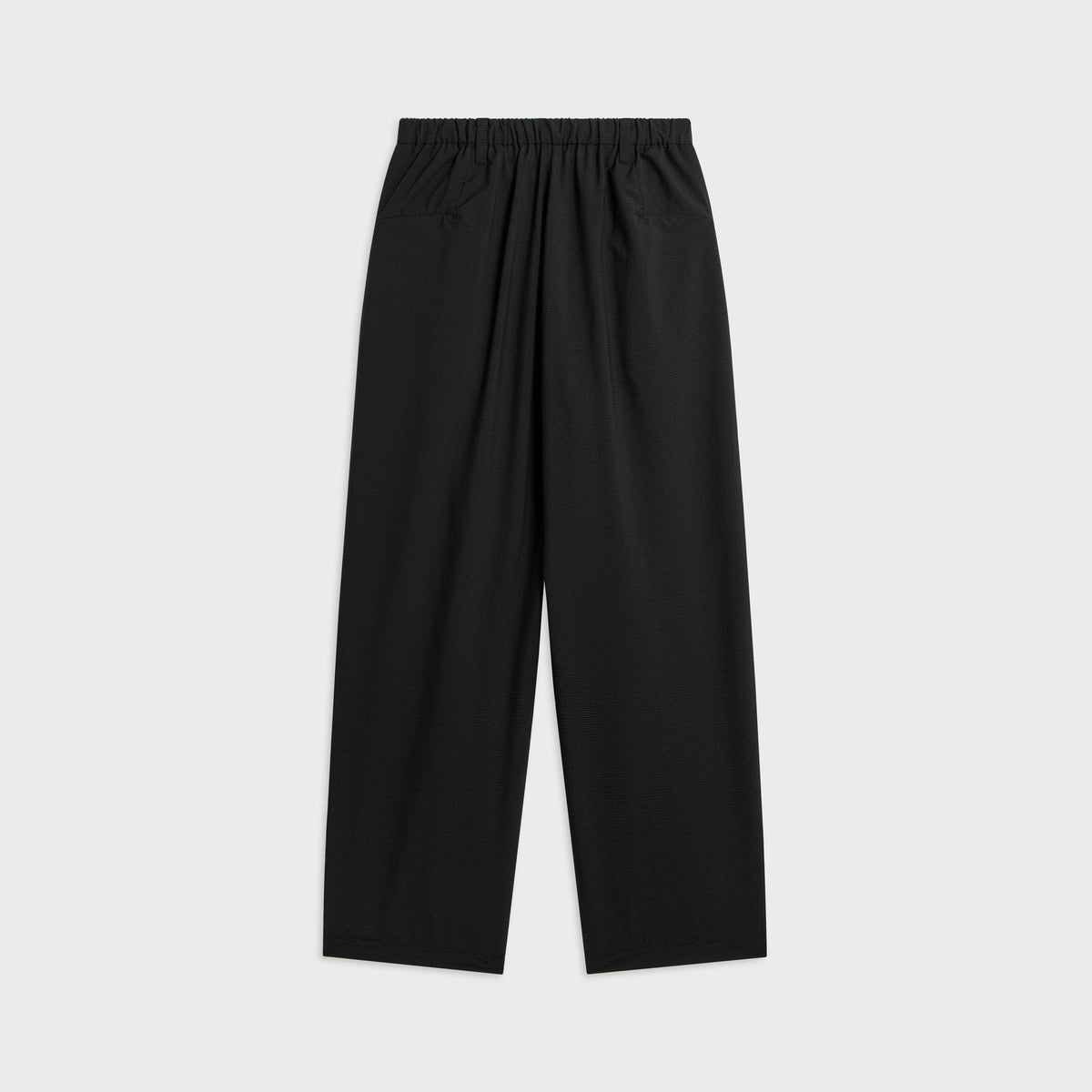 Teatora Wallet Resort Pant in grid black, back view of wide-leg trousers with elastic waistband and flat back pockets