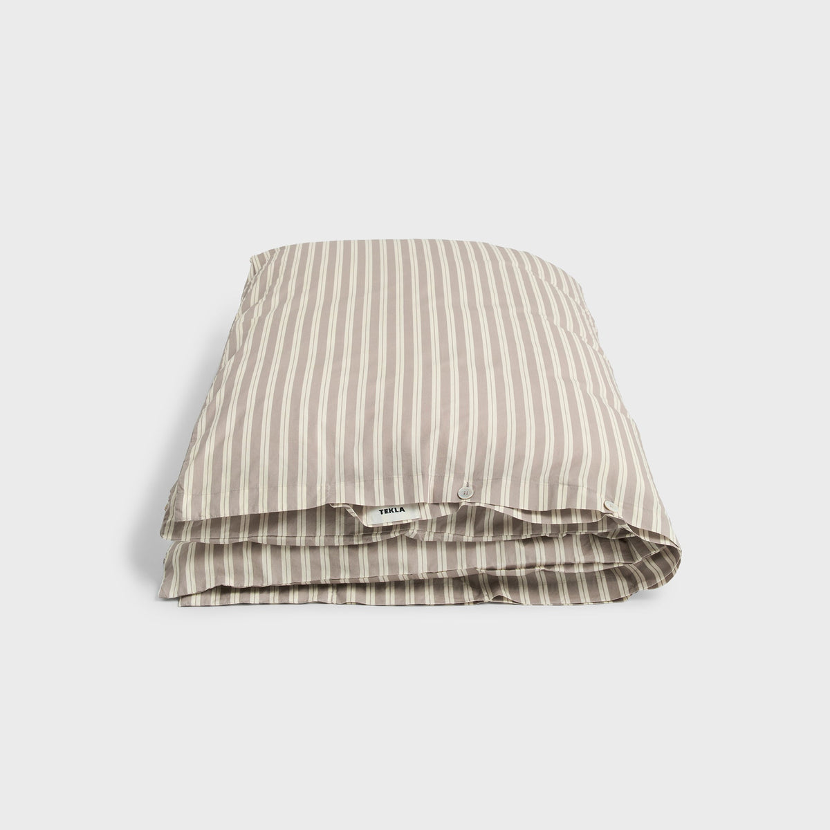 Tekla Percale Double Duvet Cover in Clay Stripes, folded beige and cream striped cotton fabric