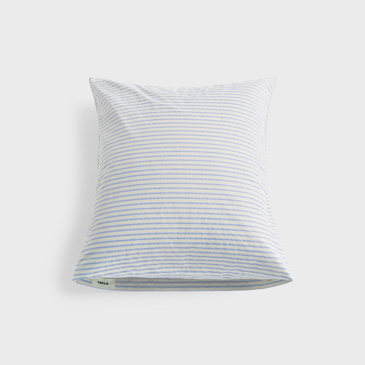 Tekla Percale Pillow Sham in Flint Stripes, light blue and white striped cotton, full front view