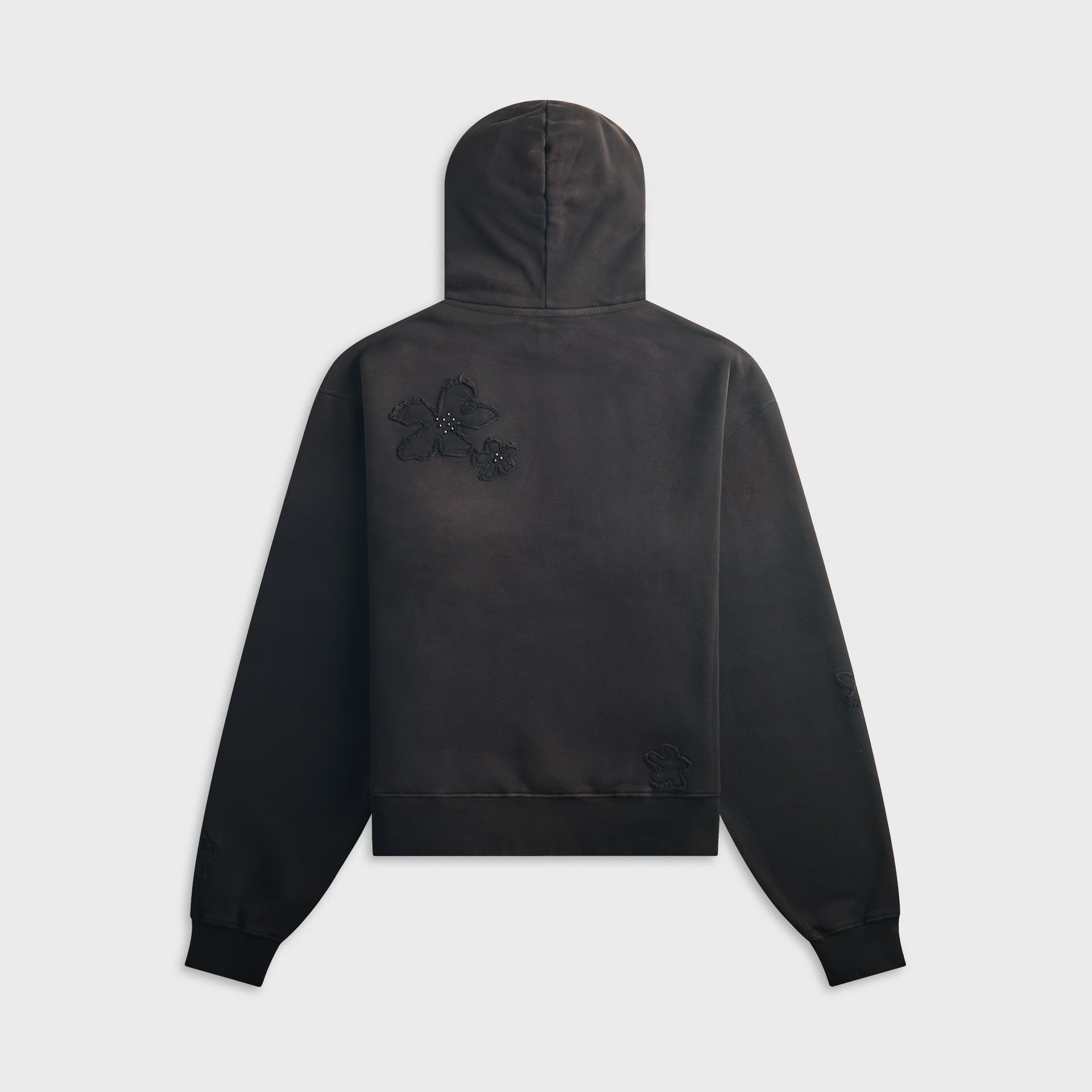 NAHMIAS Flower Patch aged black hoodie, back view with tonal floral appliques between the shoulders