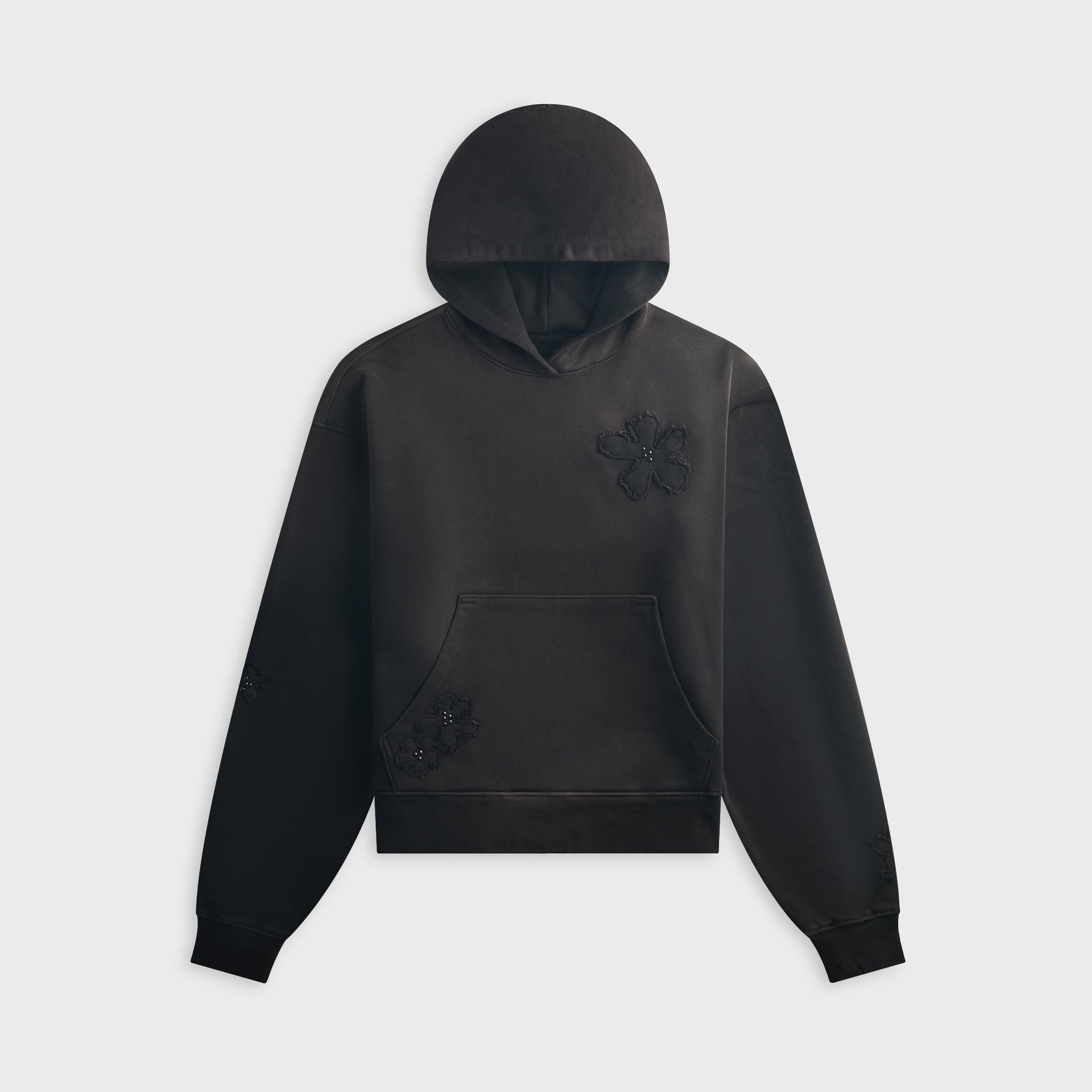NAHMIAS Flower Patch aged black pullover hoodie, front view with tonal floral appliques on chest and kangaroo pocket